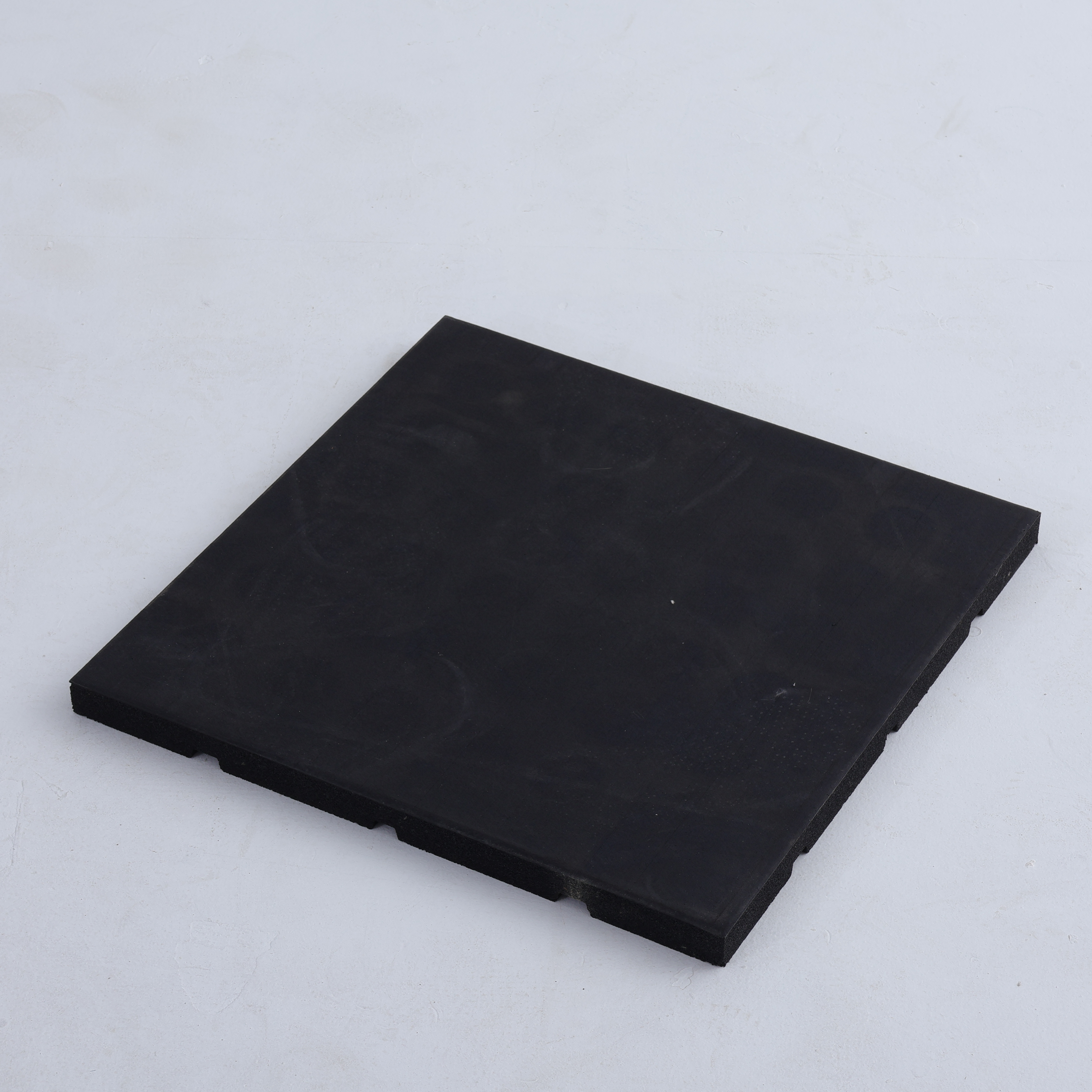 Composite fine particle rubber mat